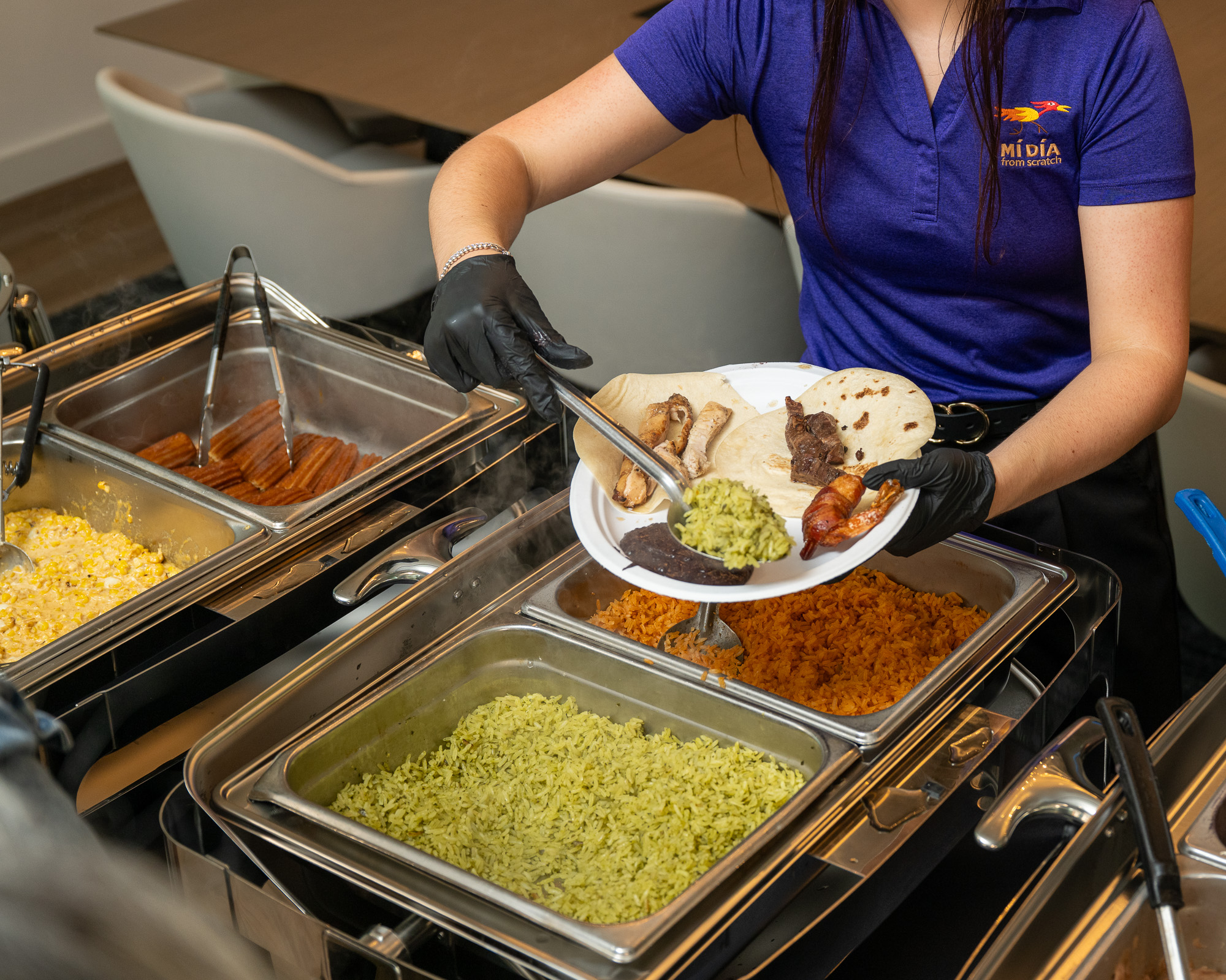 Guest plated with tacos and rice